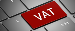 Szare przyciski klawiatury z wyróżnionym dużym, czerwonym przyciskiem z napisem VAT